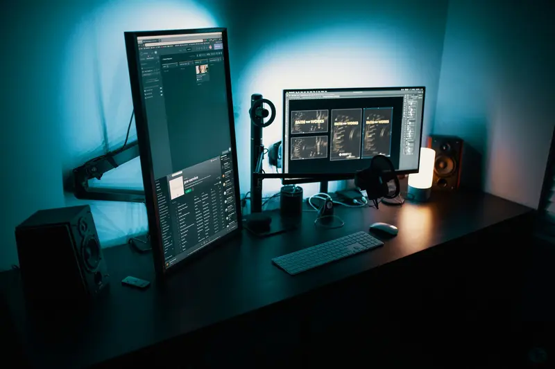 Desk lamp lighting a working monitor